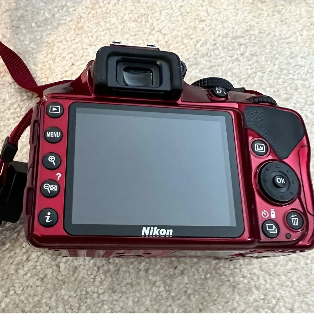 Nikon D3300 DSLR Camera with 1855mm VR II and 55200mm VR II Lenses Red and case